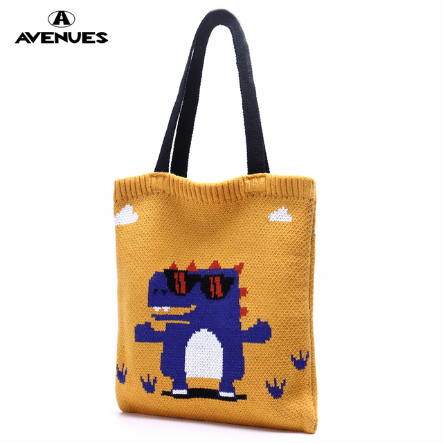 Cartoon dinosaur knitting lady WOMEN'S TOTE BAGS